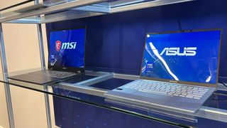 Intel Meteor Lake laptops on a shelf at Intel's unveiling event