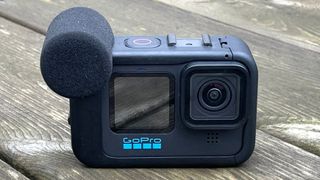 GoPro Media Mod on GoPro Hero10 Black sat outdoors with the mic and lens facing