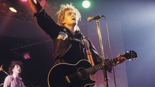 Mike Peters of The Alarm performs on stage in London, England circa 1987