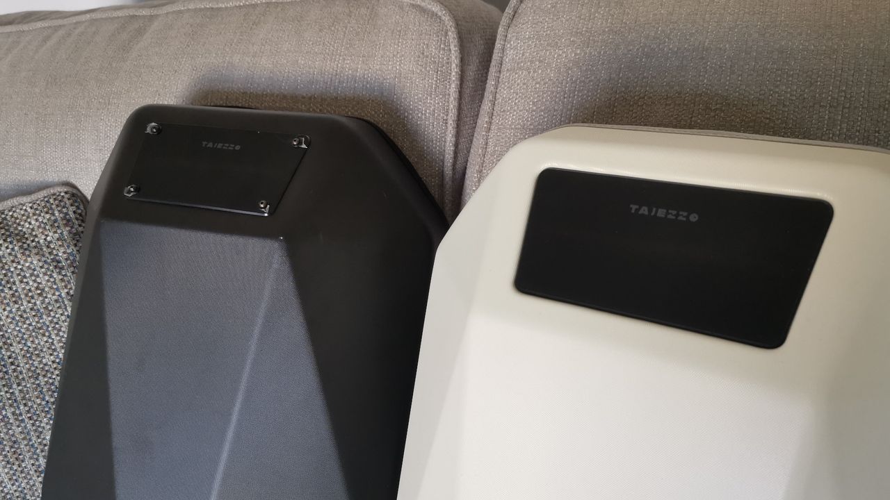 Two Tajezzo PZ5 backpacks on a couch