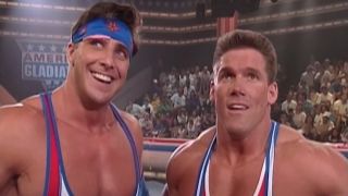 Steve Henneberry and Jim Kalafat standing in the arena during an interview in American Gladiators S4 E22.