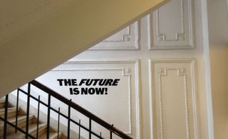 building staircase with stenciled slogans