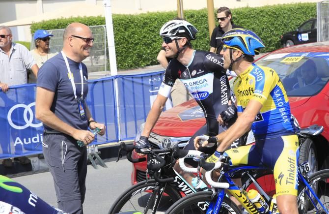 Bjarne Riis catches up with Alessandro Petacchi (Omega Pharma - QuickStep) and Matteo Tosatto (Tinkoff - Saxo)