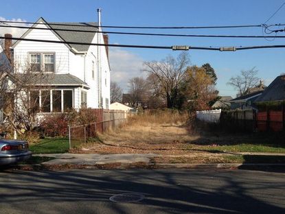 A Navy veteran returned to his West Hempstead street after months away to find his home gone