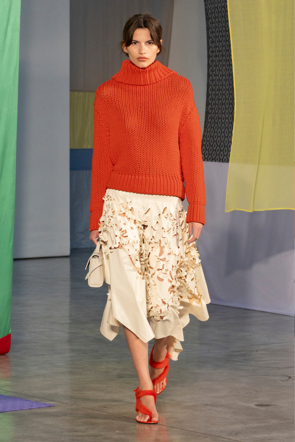 Proenza Schouler ss26 NYFW catwalk look - red jumper, cream skirt, red shoes
