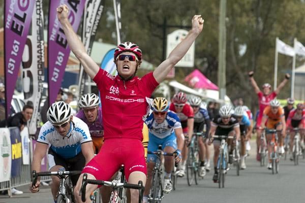 Thomas Palmer (Drapac Porsche) takes out stage nine in Euston as teammate and new tour leader Stuart Shaw joins in the celebrations behind.