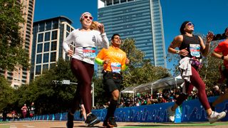 Runners approach the finish line of the Chevron Houston Marathon Sunday, Jan. 19, 2020 in Houston