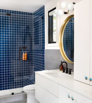 Bathroom with grey and blue wall tiles