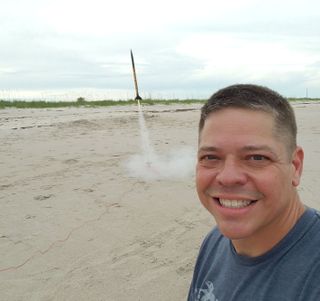 NASA astronaut Bob Behnken takes a selfie with a model rocket launching from Florida's Atlantic coast on May 26, 2020.