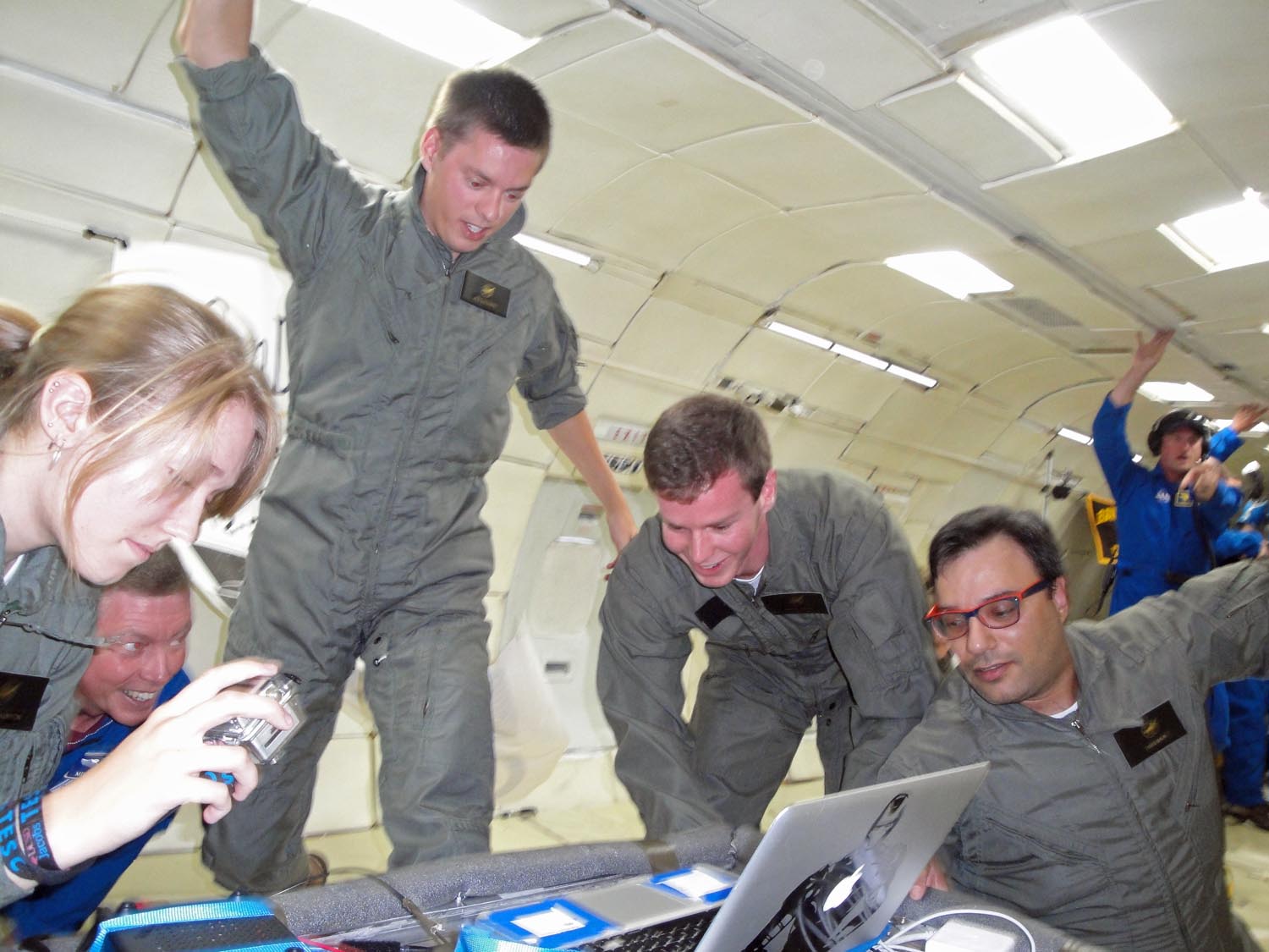 Student engineers with the UCSD Microgravity Team measure how biofuel-fed fires behave in weightlessness during a zero-gravity flight with NASA&#039;s Microgravity University and ZERO-G based out of Ellington Field, Houston on July 19, 2013.