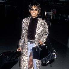 Halle Berry wearing a leopard-print coat in the '90s