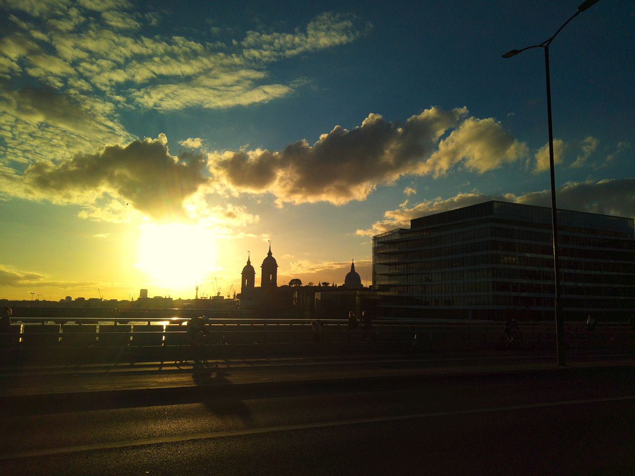 Sample image from Camp Snap CS-Pro digital compact camera showing silhouetted buildings with strong backlight.