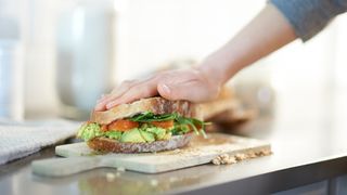 Home-made wholegrain sandwich filled with greens