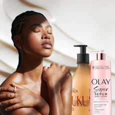 a woman with glowing skin surrounded by drugstore body lotion bottles
