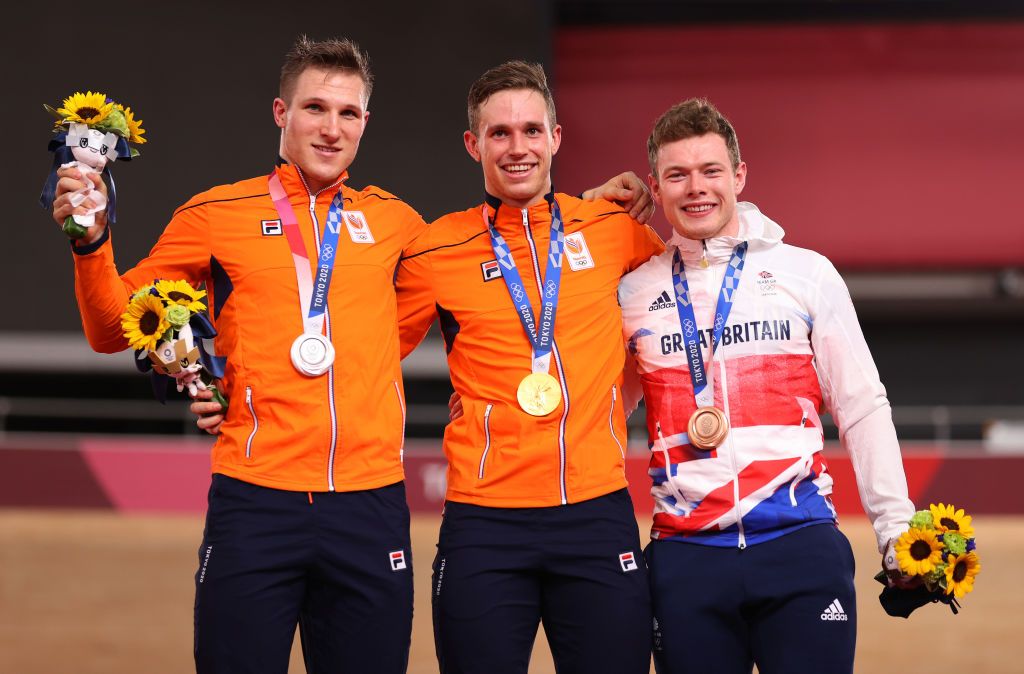 IZU JAPAN AUGUST 06 LR Silver medalist Jeffrey Hoogland of Team Netherlands gold medalist Harrie Lavreysen of Team Netherlands and bronze medalist Jack Carlin of Team Great Britain pose on the podium during the medal ceremony during the Mens sprint finals of the track cycling on day fourteen of the Tokyo 2020 Olympic Games at Izu Velodrome on August 06 2021 in Izu Japan Photo by Justin SetterfieldGetty Images