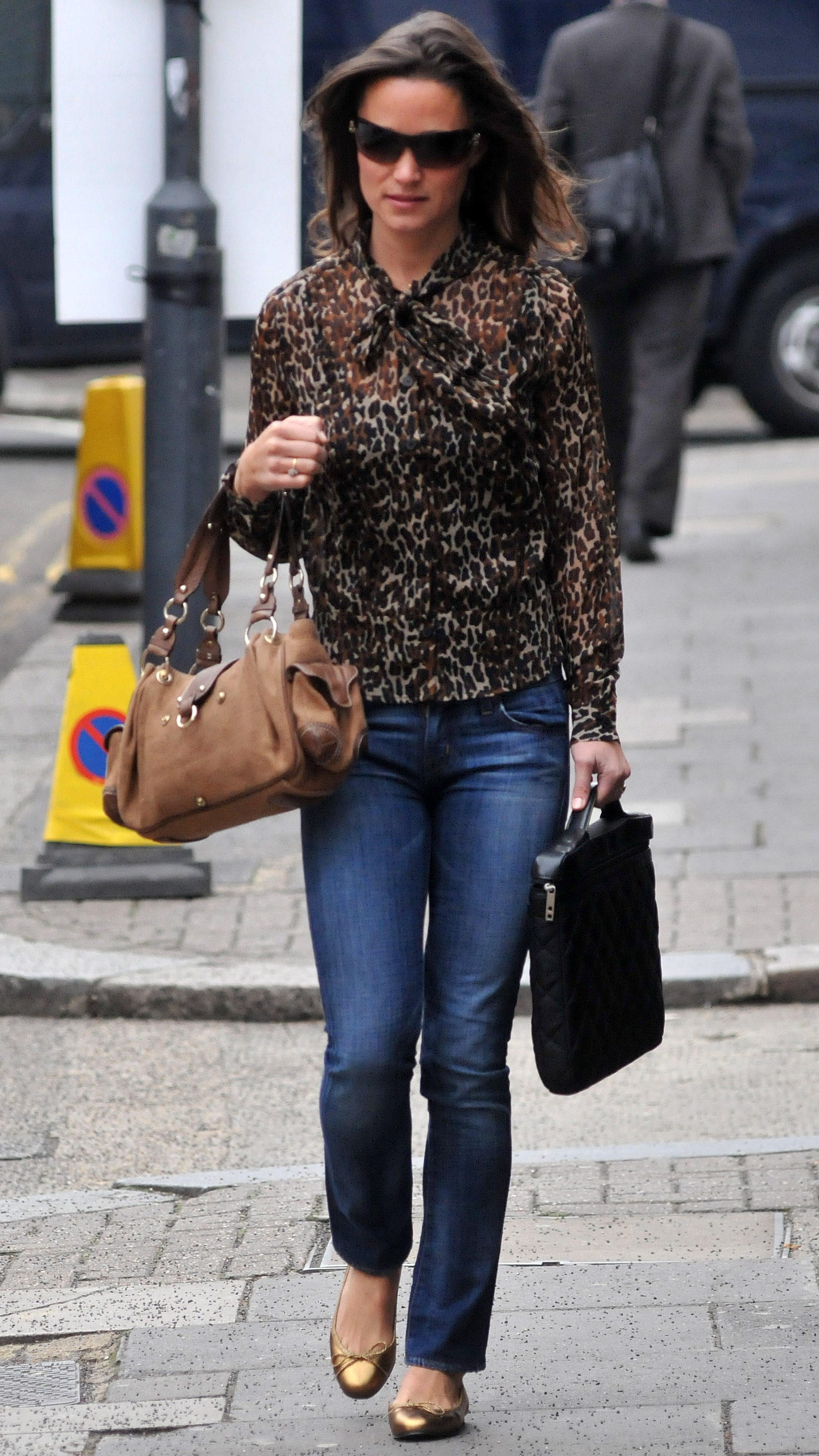 Pippa Middleton seen walking holding two bags on September 20, 2011