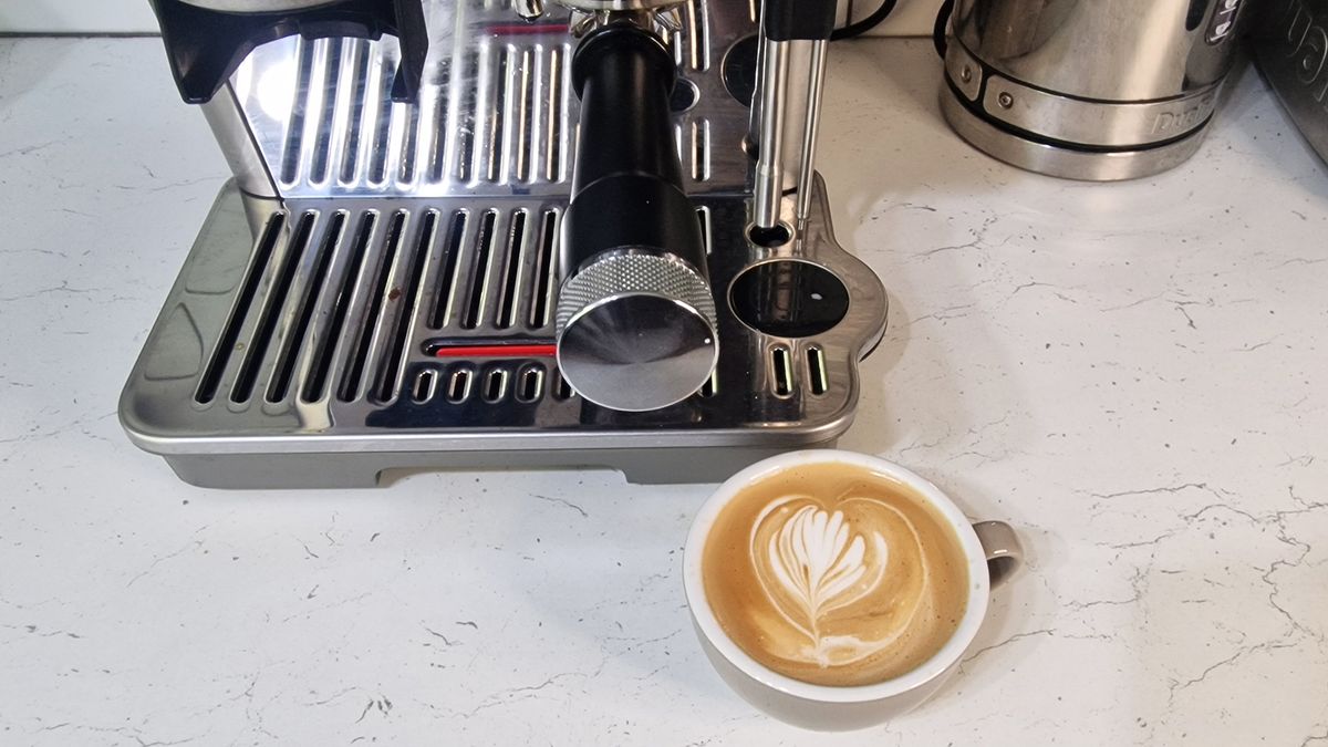 De'Longhi La Specialista Touch base and a coffee made using the machine