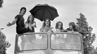 Wings atop a double decker bus in 1972
