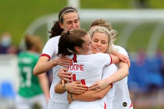 Ella Toone of England celebrates with team-mates Jill Scott and Rachel Daly