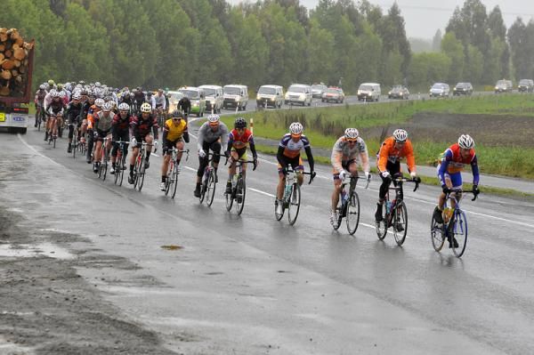 The Tour rolls along the wet roads of Southland