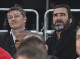 Former players Ole Gunnar Solskjaer (L) and Eric Cantona attend the unveiling of a statue of Manager Sir Alex Ferguson of Manchester United at Old Trafford on November 23, 2012 in Manchester, England