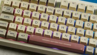 A beige, brown and off-white Epomaker RT100 wireless mechanical keyboard