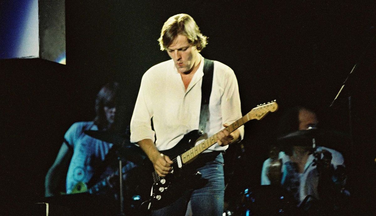 David Gilmour performs onstage with Pink Floyd at Earls Court Arena in London on August 7, 1980 