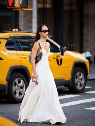 woman wearing white maxi dress