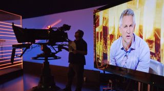 Gary Lineker shown on screen during filming of Match of the Day in 2014, 50 years after the show was first broadcast.