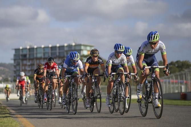 The women head up the back straight
