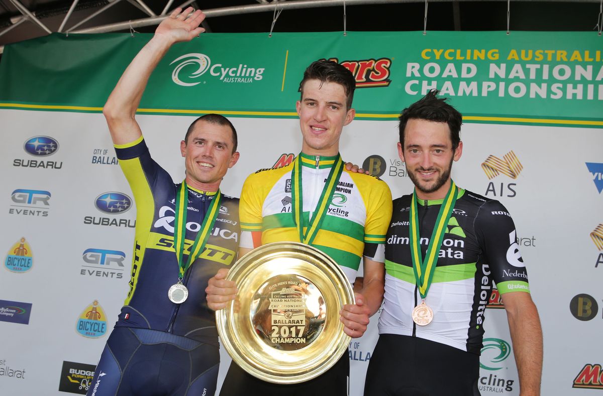 Miles Scotson on top of the podium with Gerrans and Haas