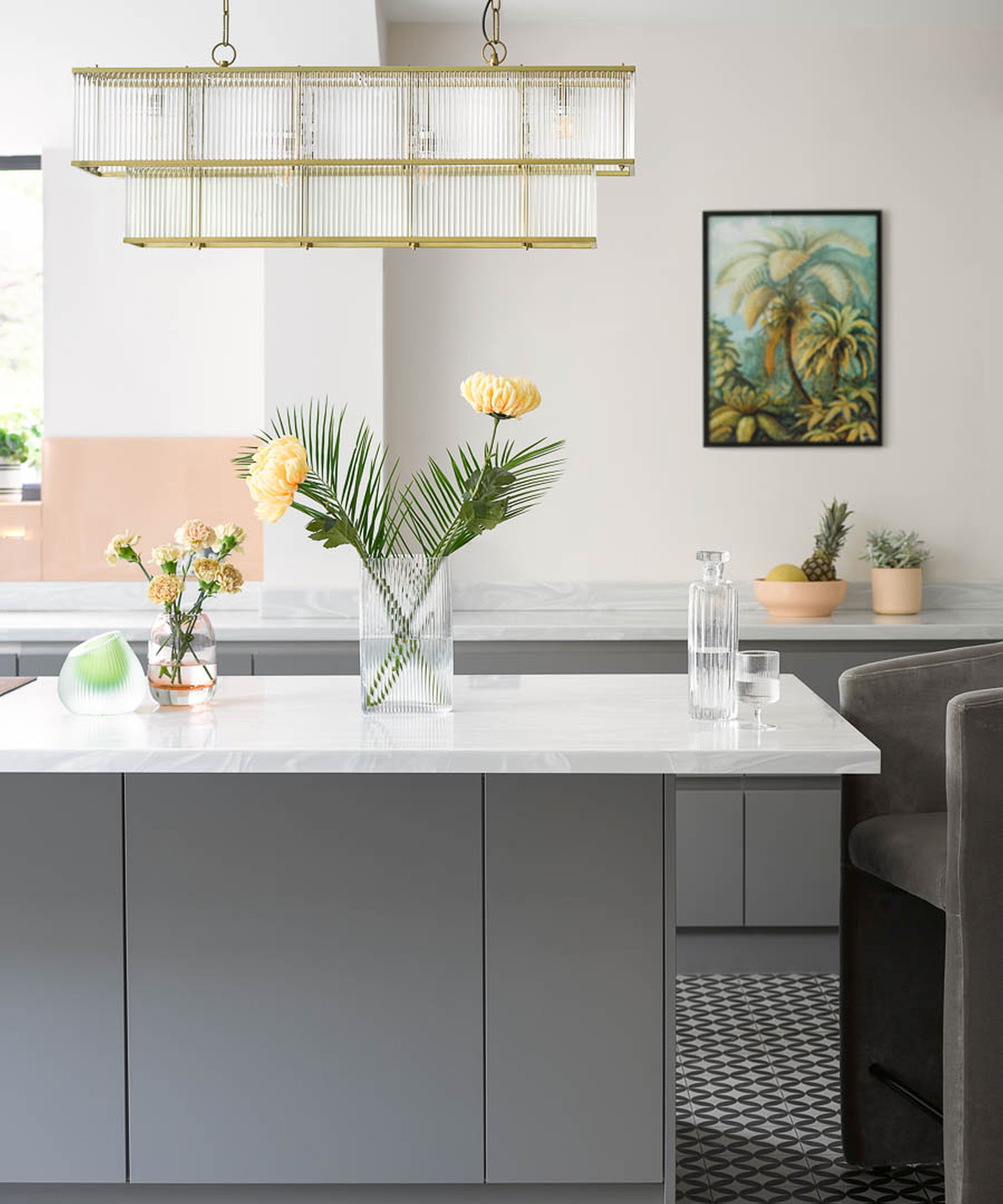 A grey kitchen with Pooky fluted glass chandelier kitchen lighting idea