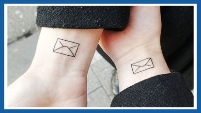 two wrists with matching tattoo ideas of envelopes, with a blue border