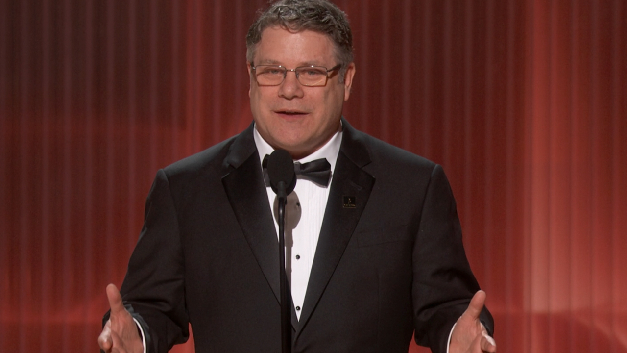 Sean Astin in a tuxedo making a speech at the Actor Awards