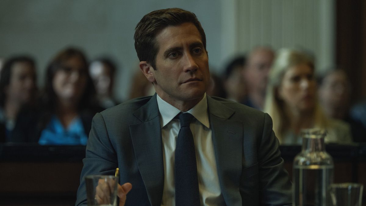 Jake Gyllenhaal sits in a courtroom