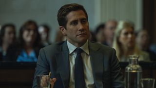 Jake Gyllenhaal sits in a courtroom