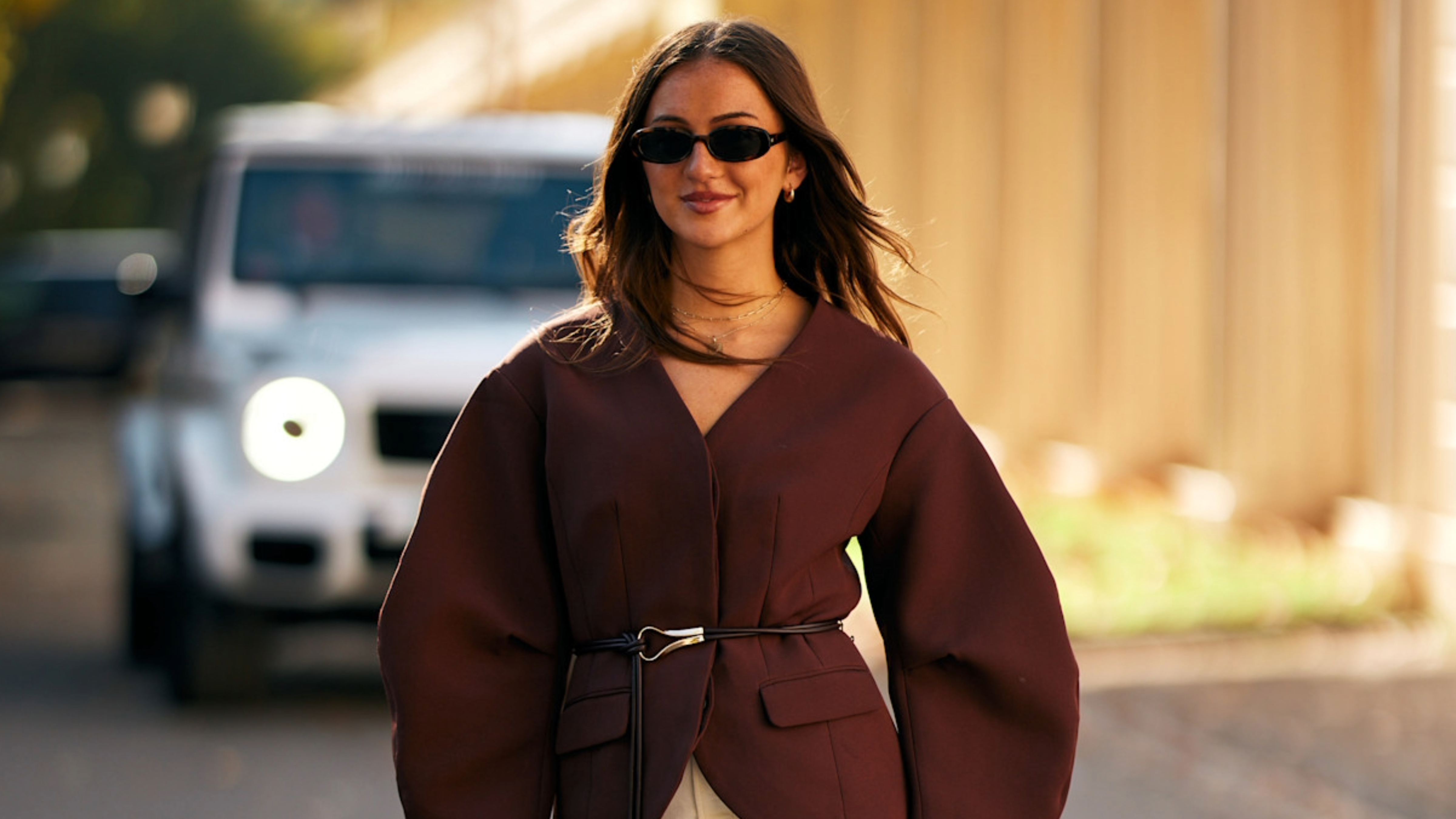 woman wearing a brown blazer 