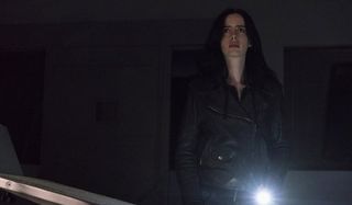 Marvel's Jessica Jones Krysten Ritter finding something unpleasant in the dark