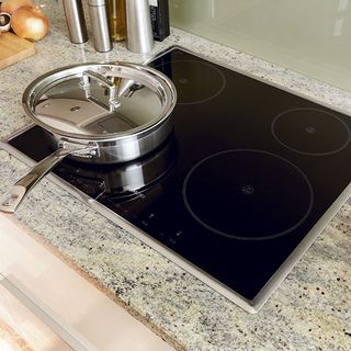 Marble with induction hob and bttles