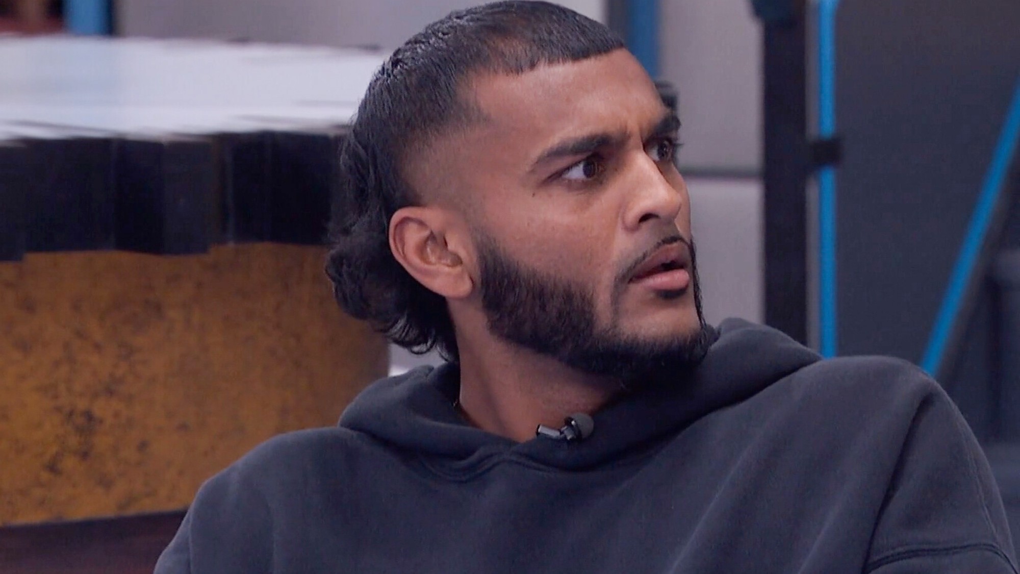 Yash with a shocked look on his face.