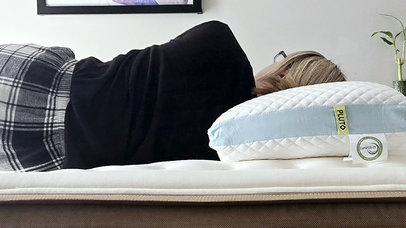 Pluto Pillow review, featuring our tester trying it out on her side and stomach