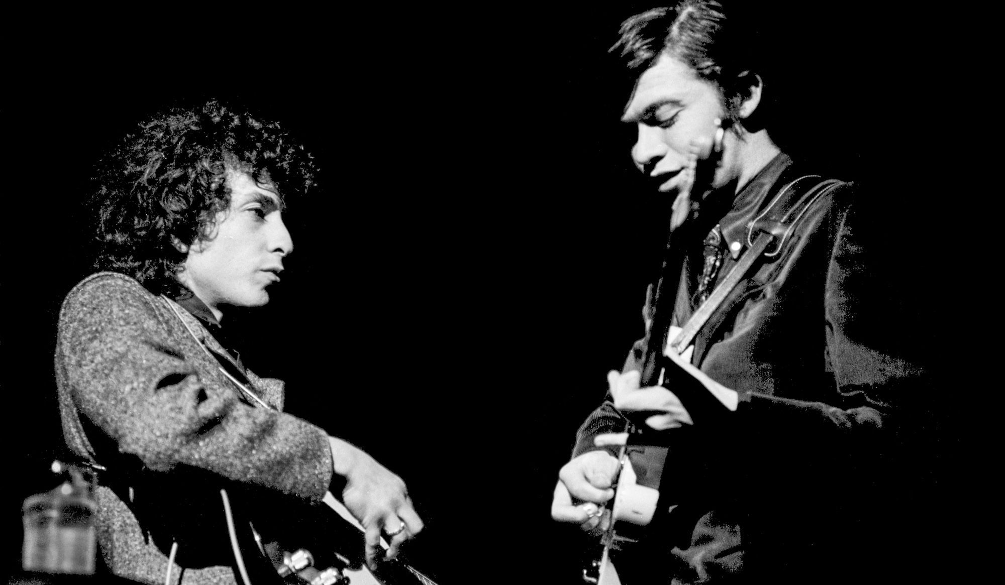 “Back then, he didn't know anything about electric guitar… It was like, ‘Don't worry Bob, I'll adjust the amp for you, it sounds great, don't worry’”: Robbie Robertson on Bob Dylan's rocky electric transition