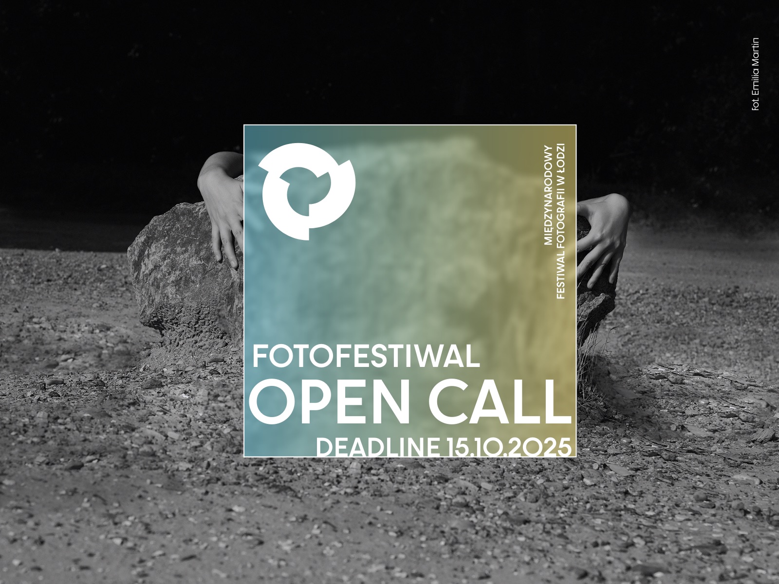 A blurred artistic image featuring a hand reaching for a rock, overlaid with an open call announcement for a photography festival