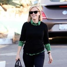 Reese Witherspoon smiling with new bob haircut.