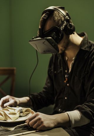 Johan Knattrup Jensen, director of the VR film "The Doghouse," tests the installation.