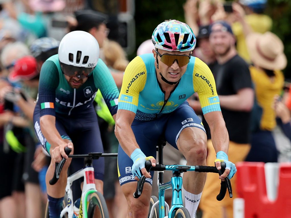 PARIS FRANCE AUGUST 03 LR Ben Healy of Team Ireland and Alexey Lutsenko of Team Kazakhstan compete during the Mens Road Race on day eight of the Olympic Games Paris 2024 at trocadero on August 03 2024 in Paris France Photo by Tim de WaeleGetty Images