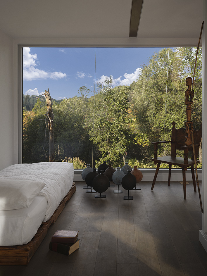 null small house, a raised steel and timber structure in the countryside that experiments as a proposal for climate resilient architecture