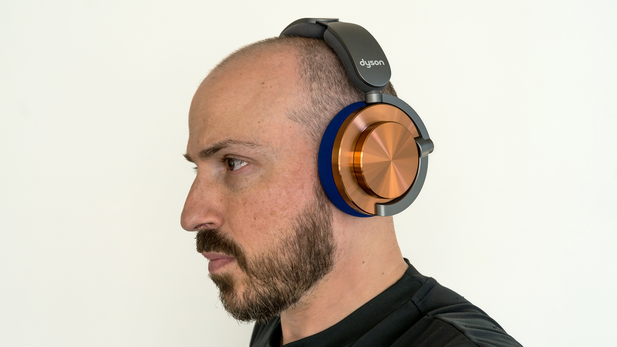 Wearing the Dyson OnTrac headphones view from the side.