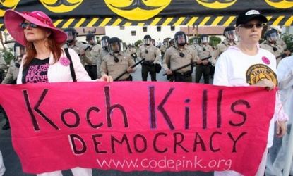 Women from the group Code Pink protest the gathering of elite Republican donors, including billionaire brothers Charles and David Koch in January in Rancho Mirage, Calif.