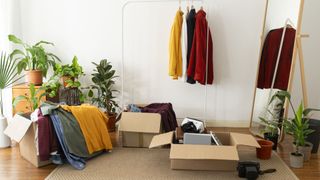 clothes being organised into boxes